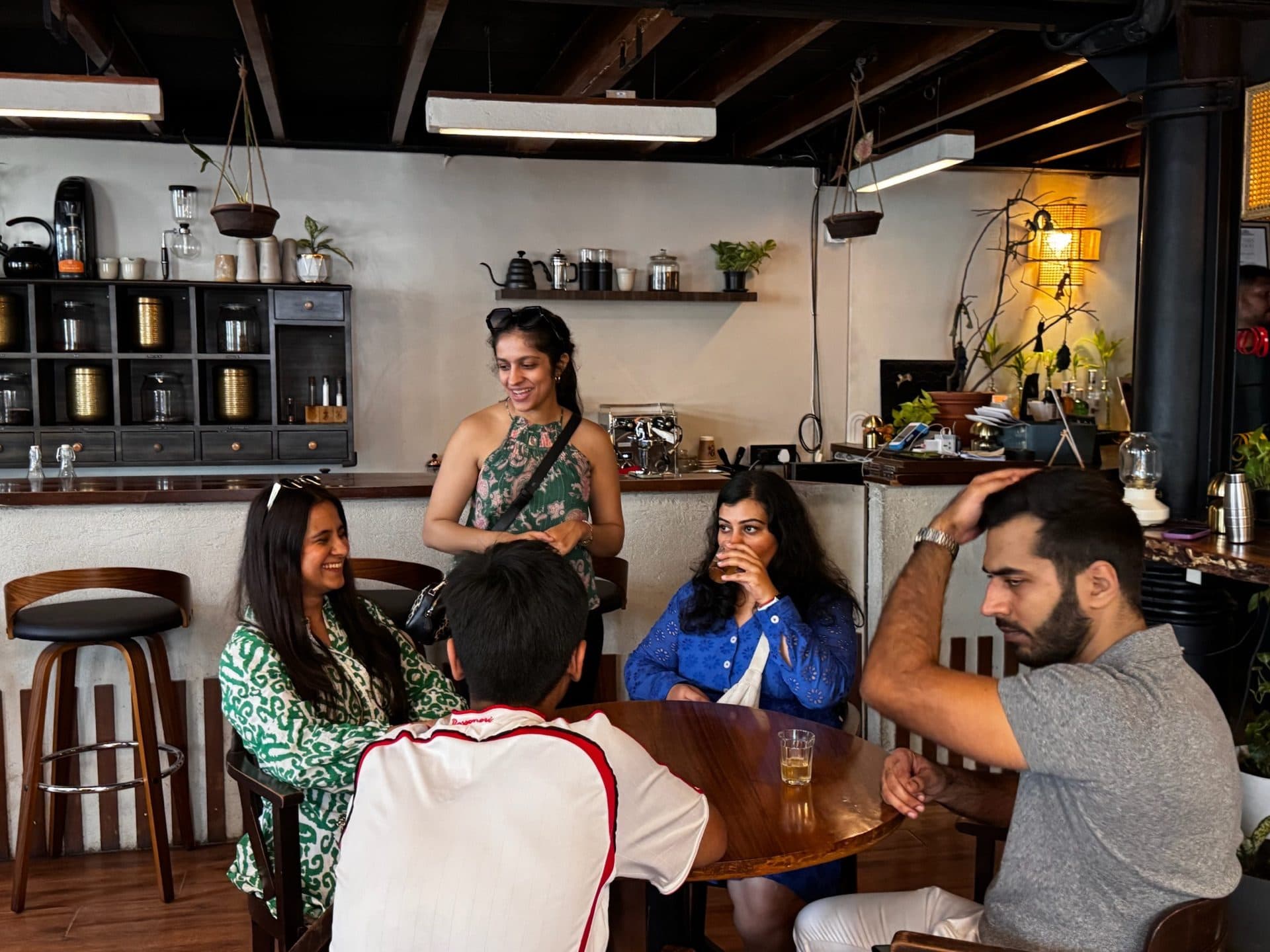 Guests sampling brews at the tea and coffee counter